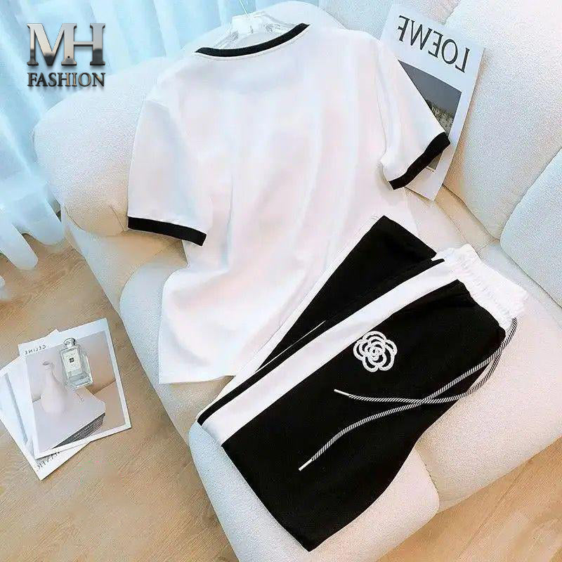 BLACK AND WHITE STRIP DESIGN  NIGHTSUIT FOR GIRLS AND WOMENS IN COTTON JARSY FABRIC (M.H  89)